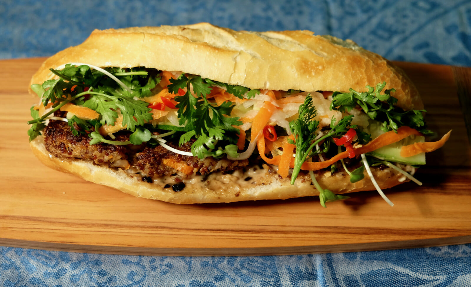 Vegetarian banh mi (banh mi chay) with a mushroom quinoa patty