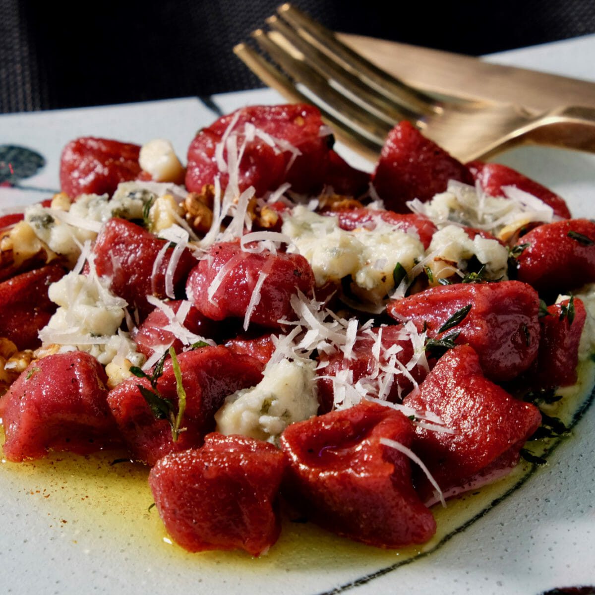 Beetroot and ricotta gnocchi with a brown butter sauce, walnuts and