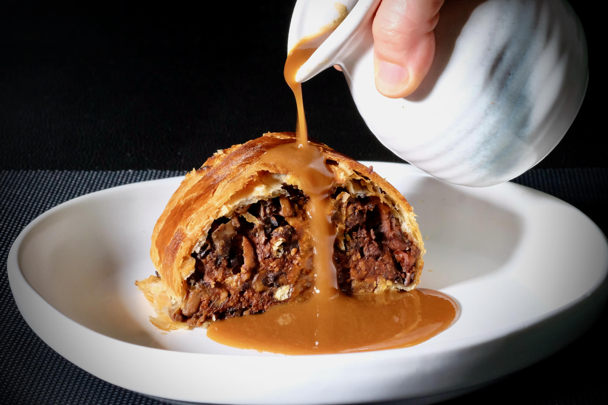 Black Bean Wellington with a mushroom miso gravy delectabilia