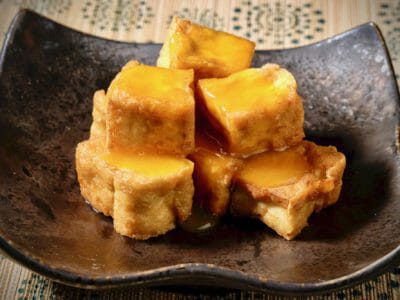 egg-yolk-sauce-on-crispy-tofu