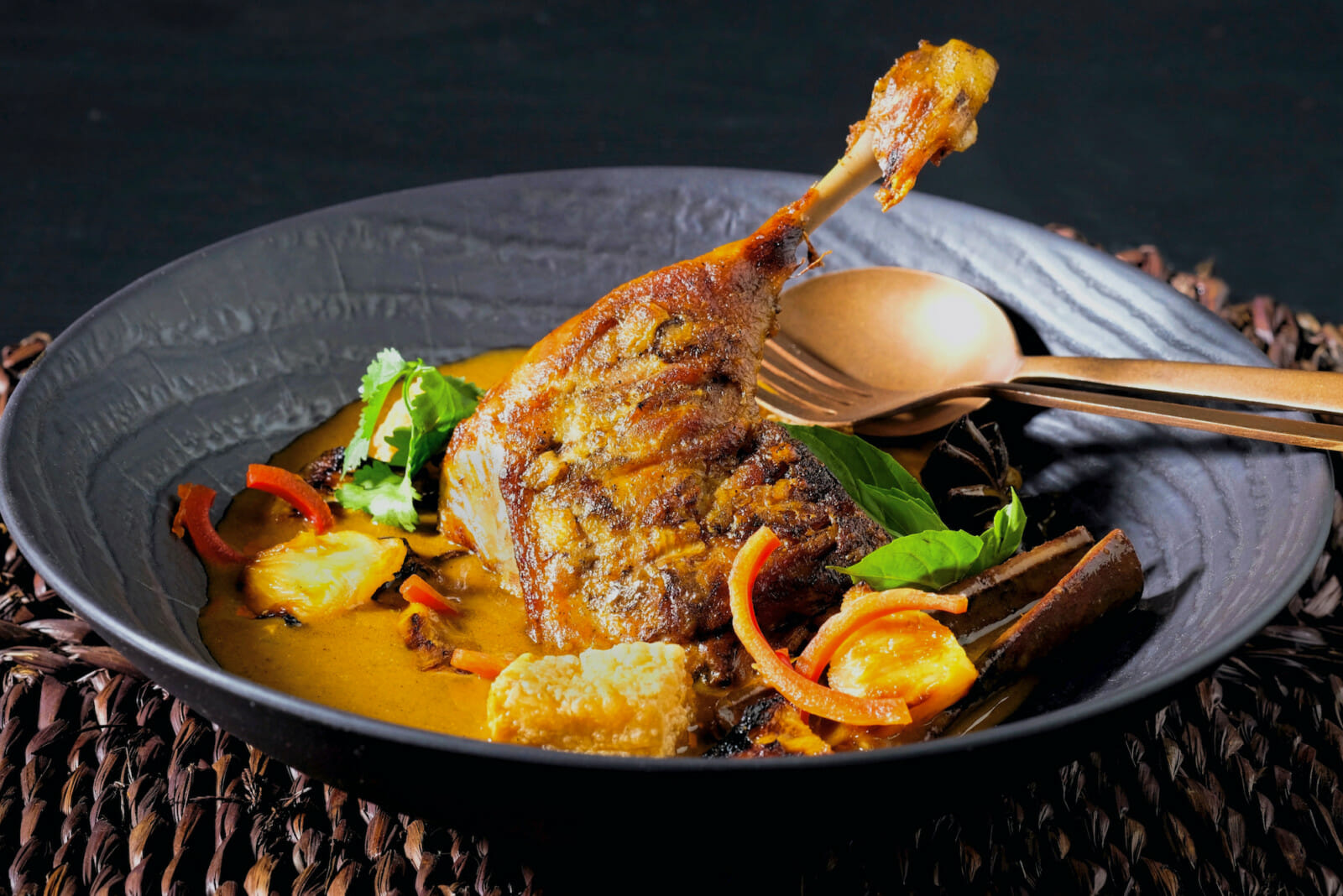 Massaman Curry with Confit Duck Leg and Charred Pineapple delectabilia
