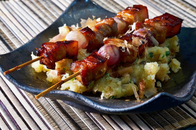 pork-belly-skewers-on-mashed-potato-salad