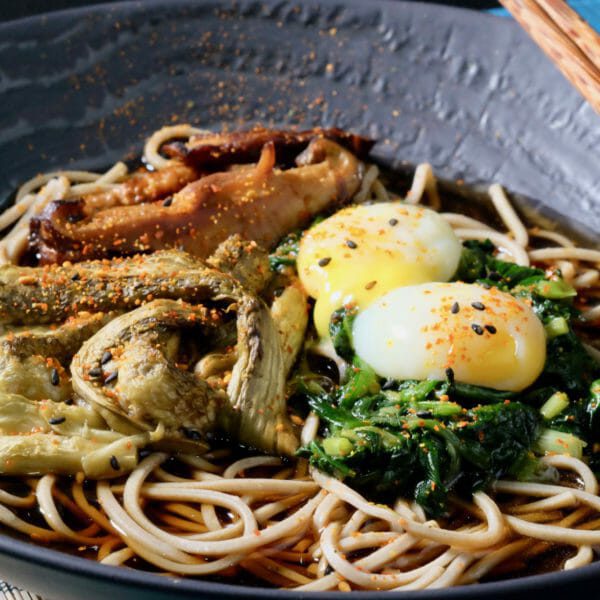 Soba noodles with grilled eggplant, spinach, and quail eggs delectabilia
