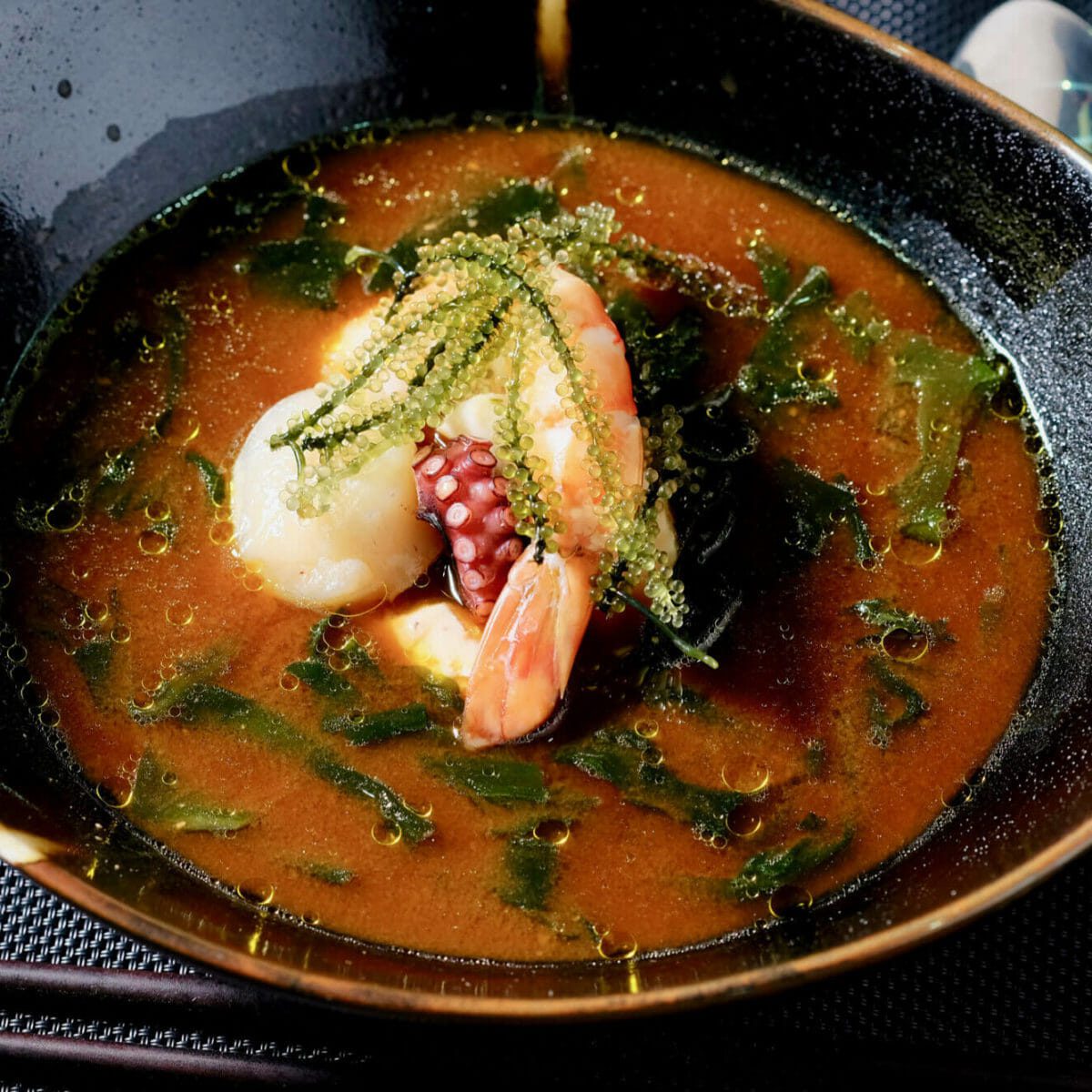 Sake steamed seafood in red miso soup delectabilia