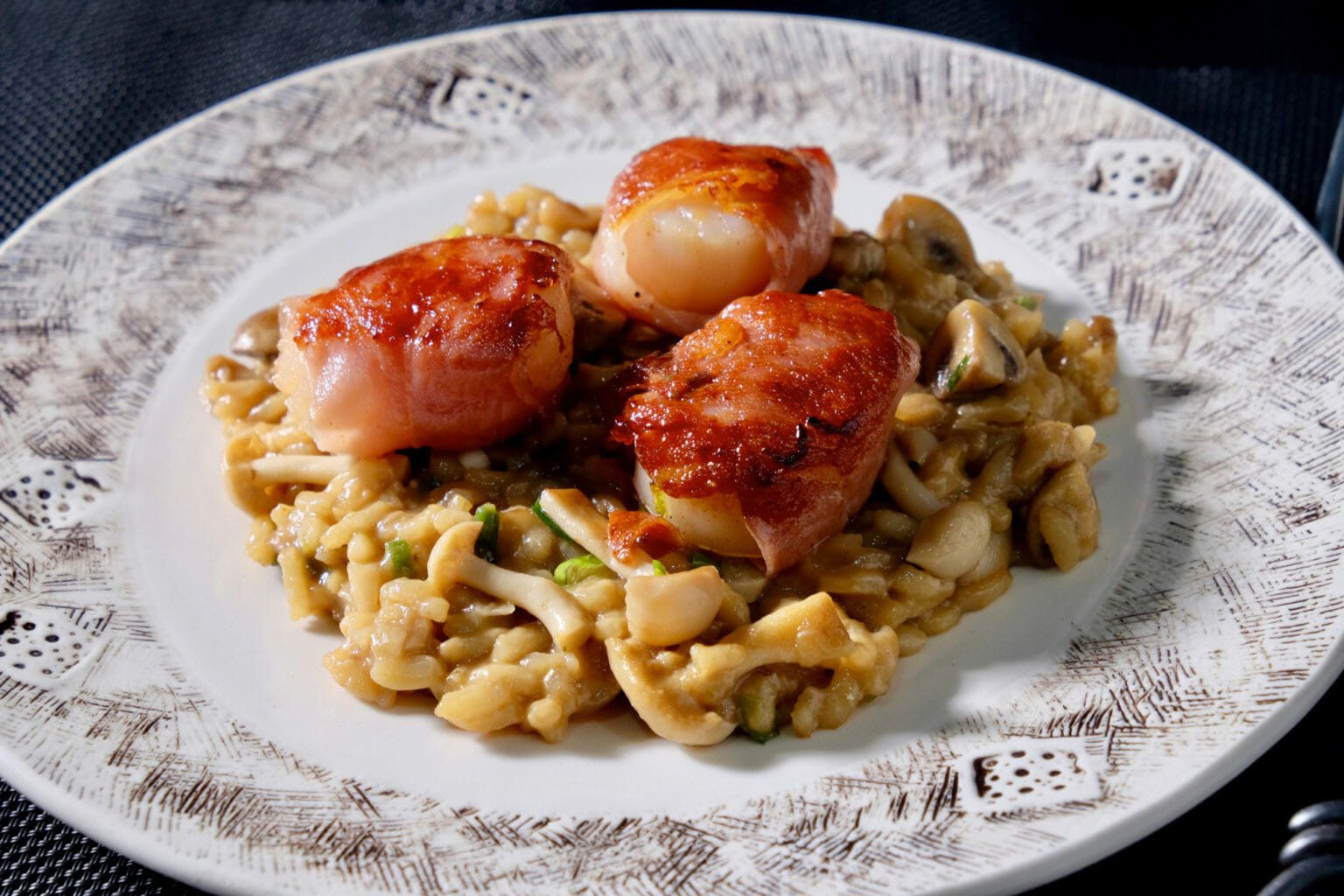 Mushroom risotto with scallops wrapped in pancetta delectabilia