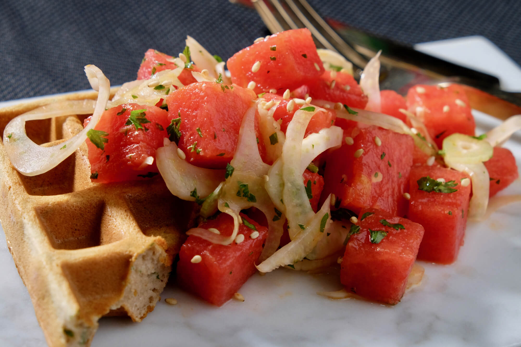 Watermelon fennel salad on a buckwheat ricotta waffle delectabilia